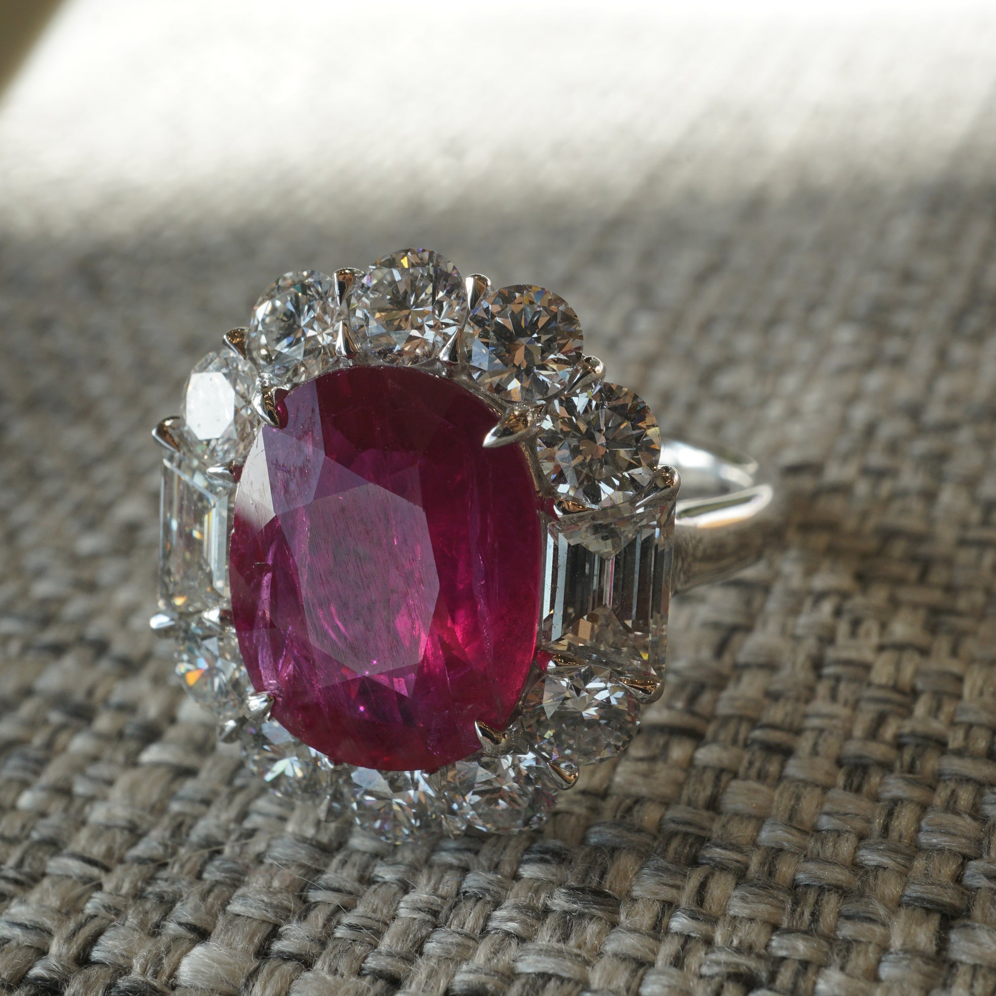 Cushion Cut Ruby & Diamond Cocktail Ring in PlatinumComposition: PlatinumRing Size: 6.25Total Diamond Weight: 2.65 ctTotal Gram Weight: 9.04 gInscription: PLAT SOPHIA D. 3855C R 4.77 D 0.83 1.82
