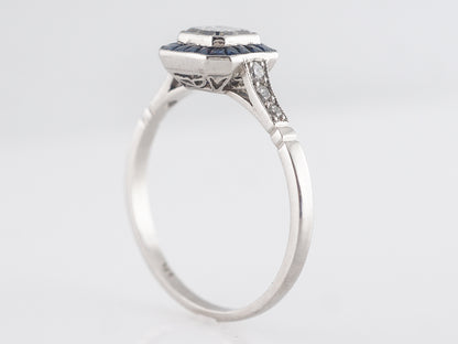 Asscher Cut Diamond & Sapphire Engagement in Platinum