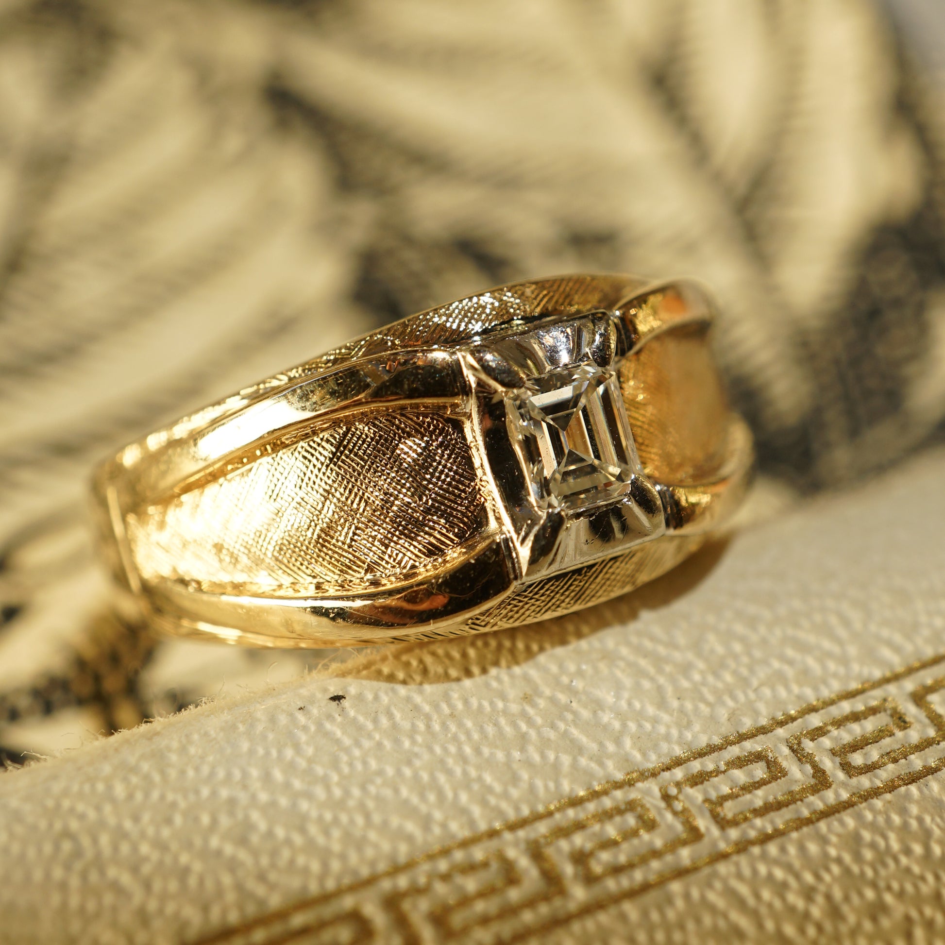 .24 Mid-Century Emerald Cut Diamond Ring in 14k Yellow GoldaComposition: 14 Karat White Gold/14 Karat Yellow Gold Ring Size: 7.5 Total Diamond Weight: .24ct Total Gram Weight: 7.1 g Inscription: 14k, K.M.D. TO J.L.M. 9-9-61
      