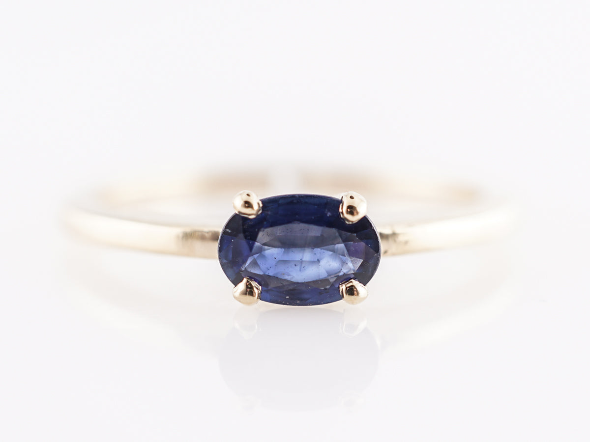 Oval Cut Sapphire Engagement Ring in 14K Yellow Gold