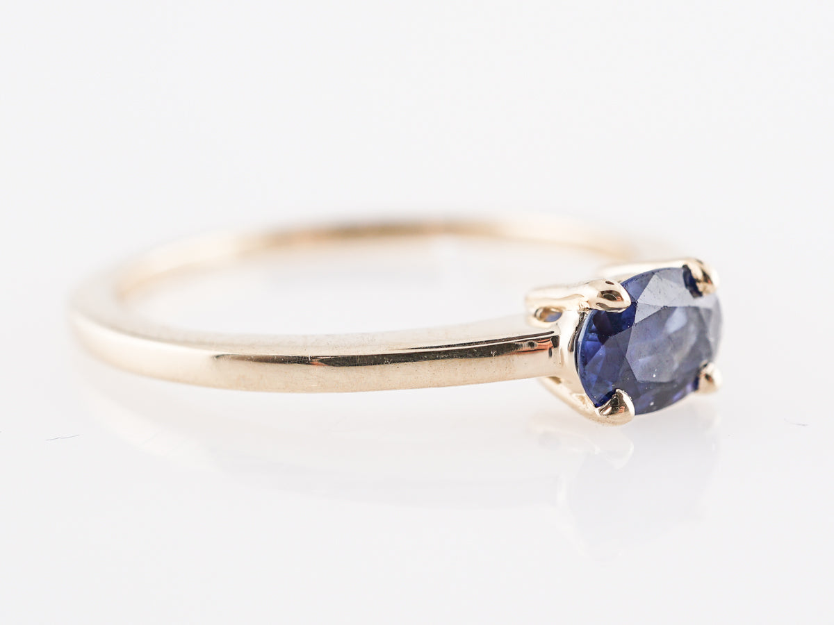 Oval Cut Sapphire Engagement Ring in 14K Yellow Gold