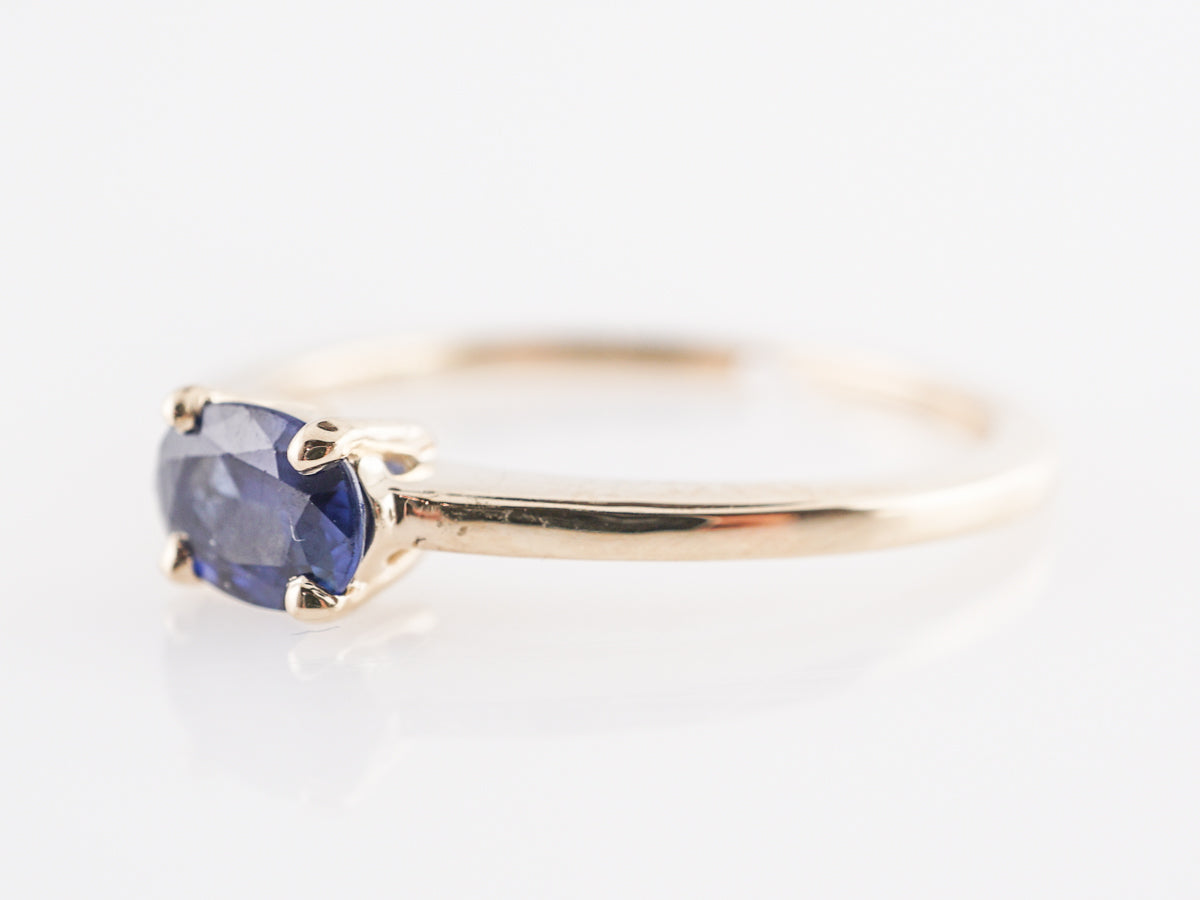 Oval Cut Sapphire Engagement Ring in 14K Yellow Gold