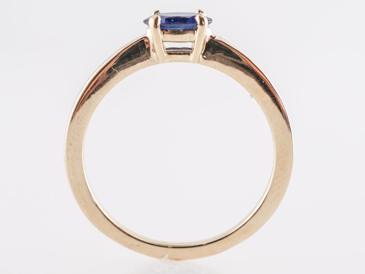 Oval Cut Sapphire Engagement Ring in 14K Yellow Gold