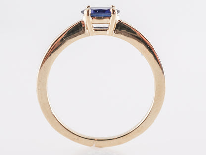 Oval Cut Sapphire Engagement Ring in 14K Yellow Gold