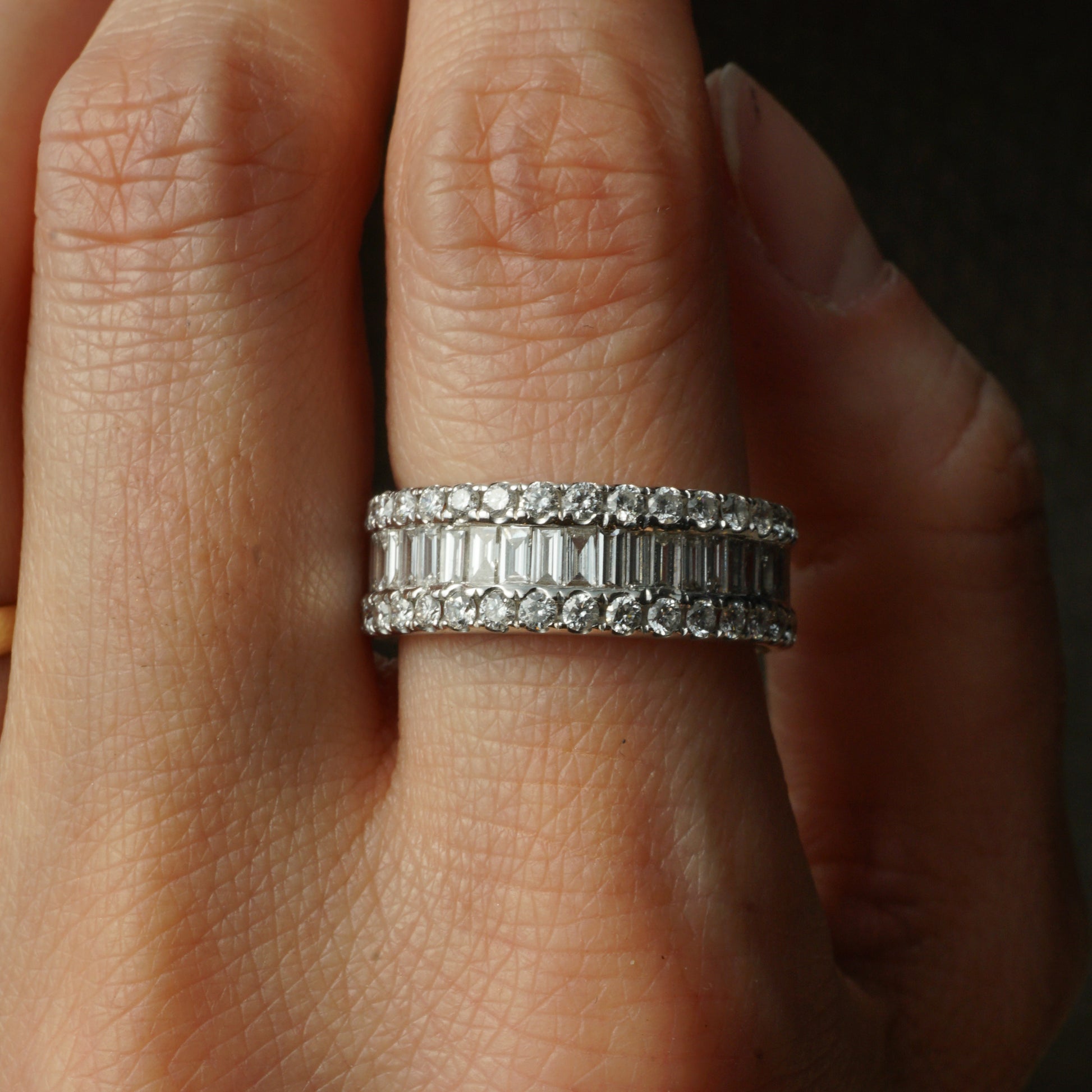 2.65 Baguette & Round Cut Diamond Eternity Band in 18k White GoldComposition: Platinum Ring Size: 6.5 Total Diamond Weight: 2.65ct Total Gram Weight: 4.7 g Inscription: 18K 750 D2.65
      