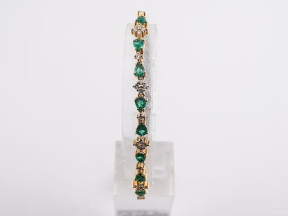 Mid-Century Pear Cut Emerald & Diamond Bracelet in 18K Yellow Gold