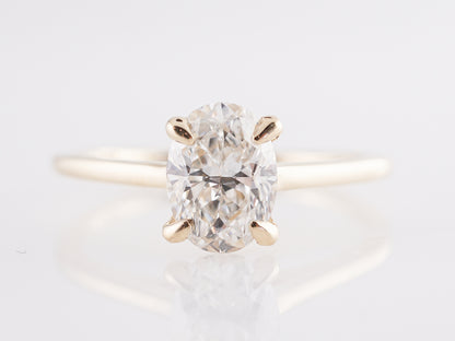Solitaire 1 Carat Oval Diamond Engagement Ring in 14K