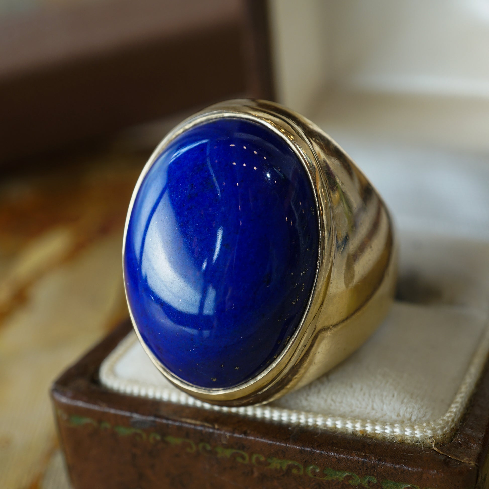 Oval Lapis Lazuli Cocktail Ring in 14k Yellow GoldComposition: 14 Karat Yellow Gold Ring Size: 9.5 Total Gram Weight: 21.1 g