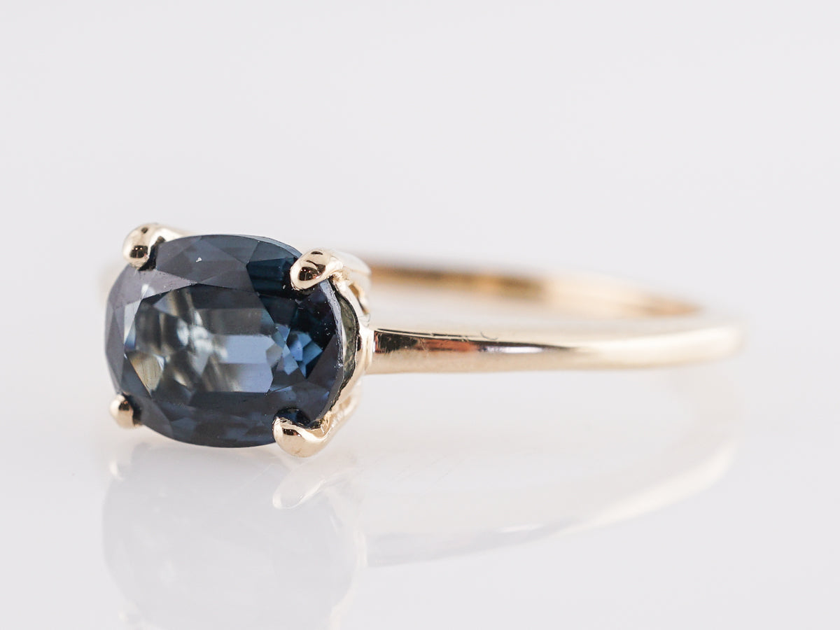 1.61 Carat Oval Sapphire Engagement Ring in 14K Yellow Gold