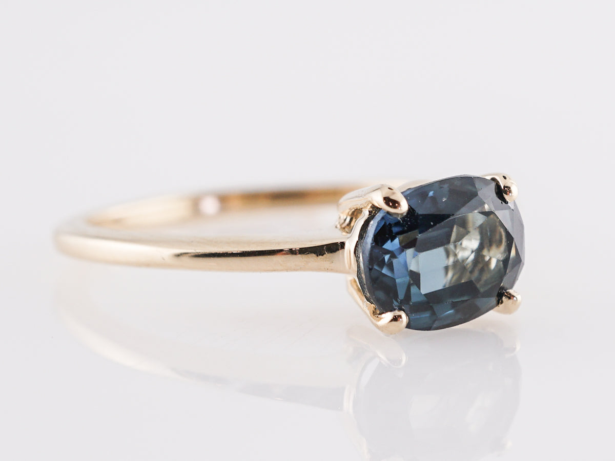 1.61 Carat Oval Sapphire Engagement Ring in 14K Yellow Gold