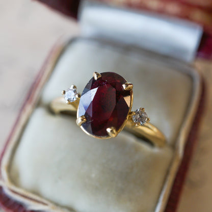 Oval Cut Ruby Engagement Ring in 14k Yellow Gold