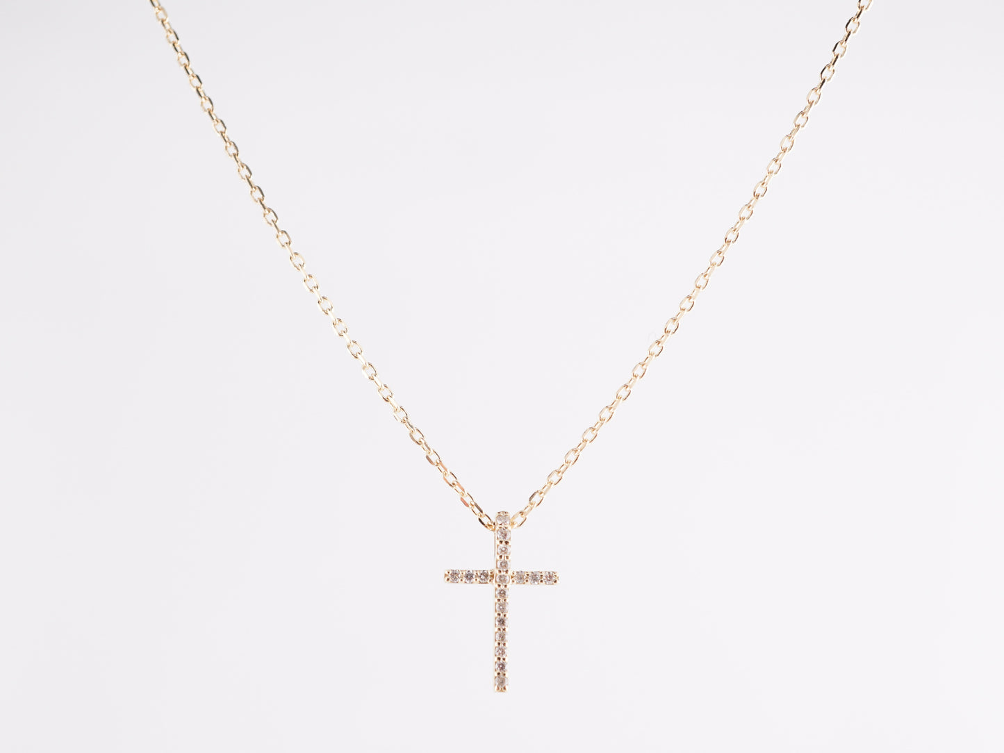 .07 Diamond Cross Necklace in 14k Yellow Gold