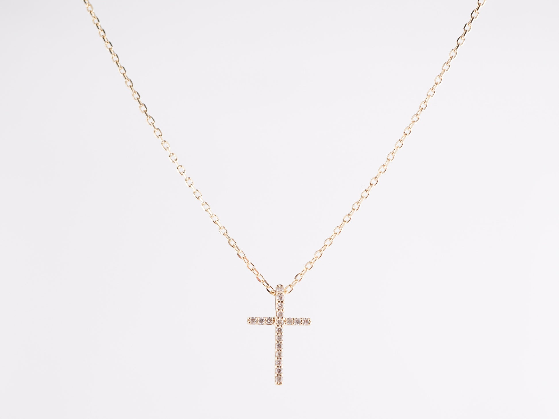 .07 Diamond Cross Necklace in 14k Yellow Gold