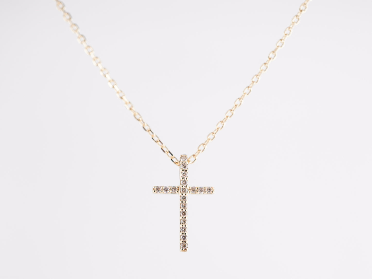 .07 Diamond Cross Necklace in 14k Yellow Gold