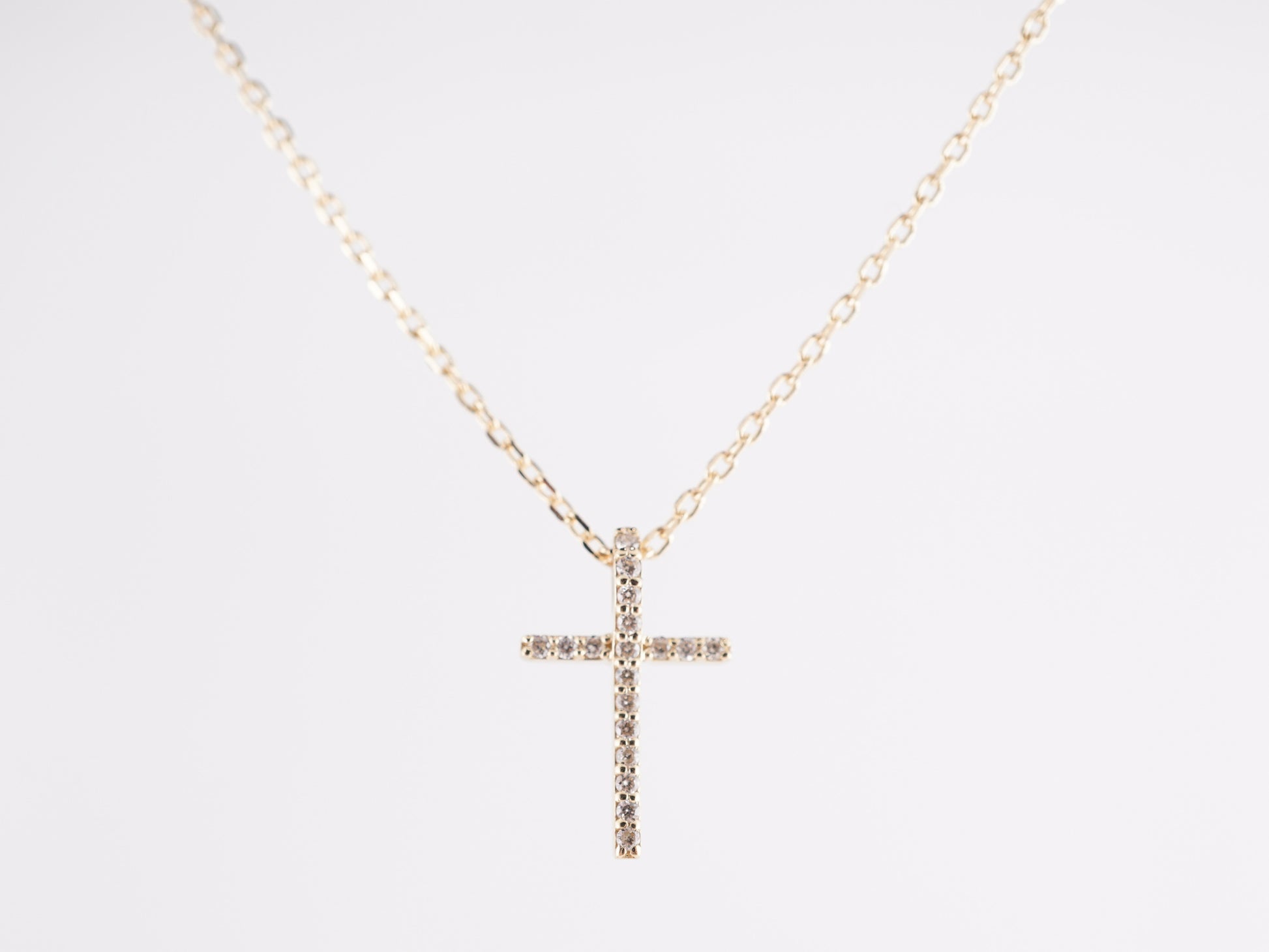 .07 Diamond Cross Necklace in 14k Yellow Gold