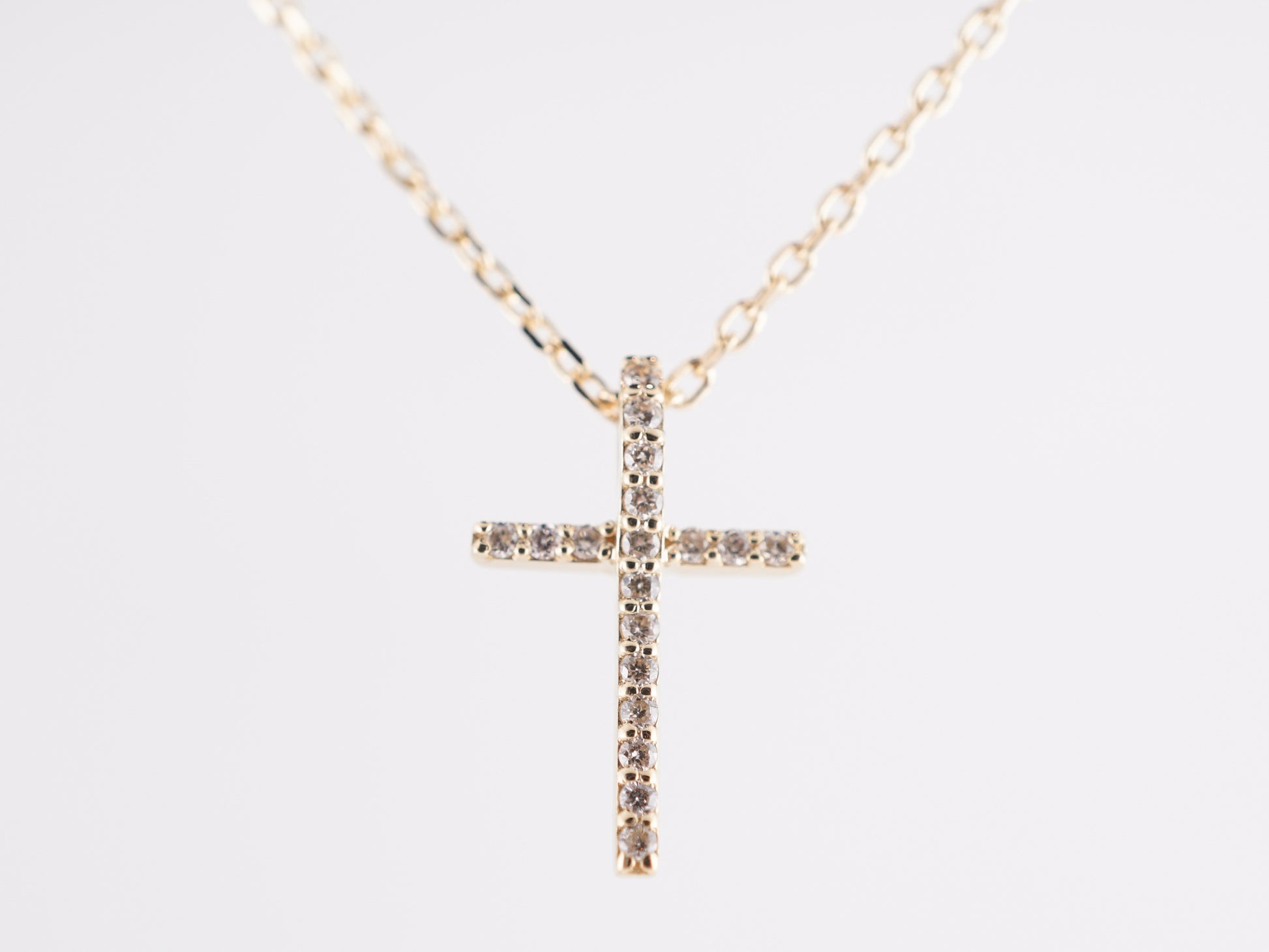 .07 Diamond Cross Necklace in 14k Yellow Gold