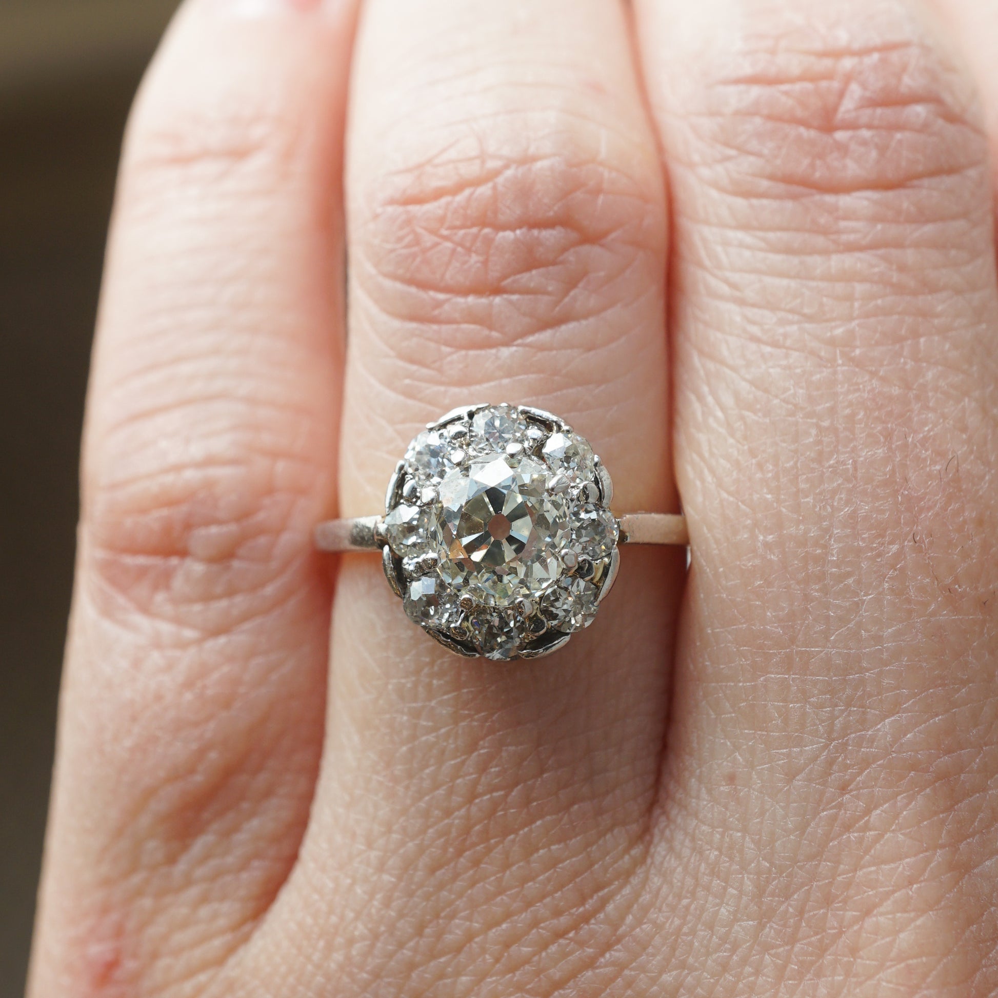 .93 Victorian Diamond Halo Engagement Ring in Platinum & 18kComposition: Platinum/18 Karat Yellow Gold Ring Size: 5 Total Diamond Weight: 1.33ct Total Gram Weight: 3.0 g