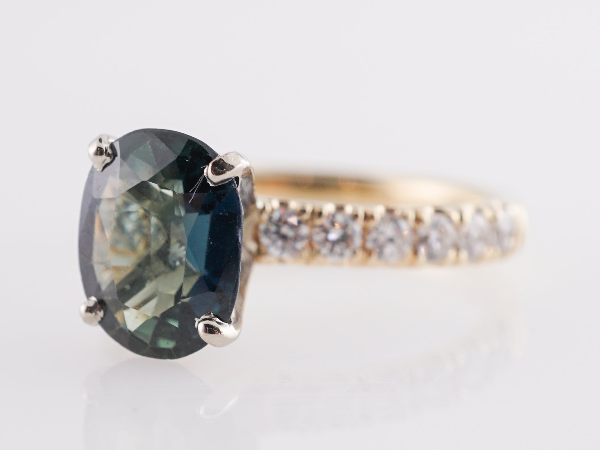 2.44 Oval Green Sapphire Engagement Ring in 14K Yellow GoldComposition: PlatinumRing Size: 6.5Total Diamond Weight: .44 ctTotal Gram Weight: 2.8 gInscription: 14k