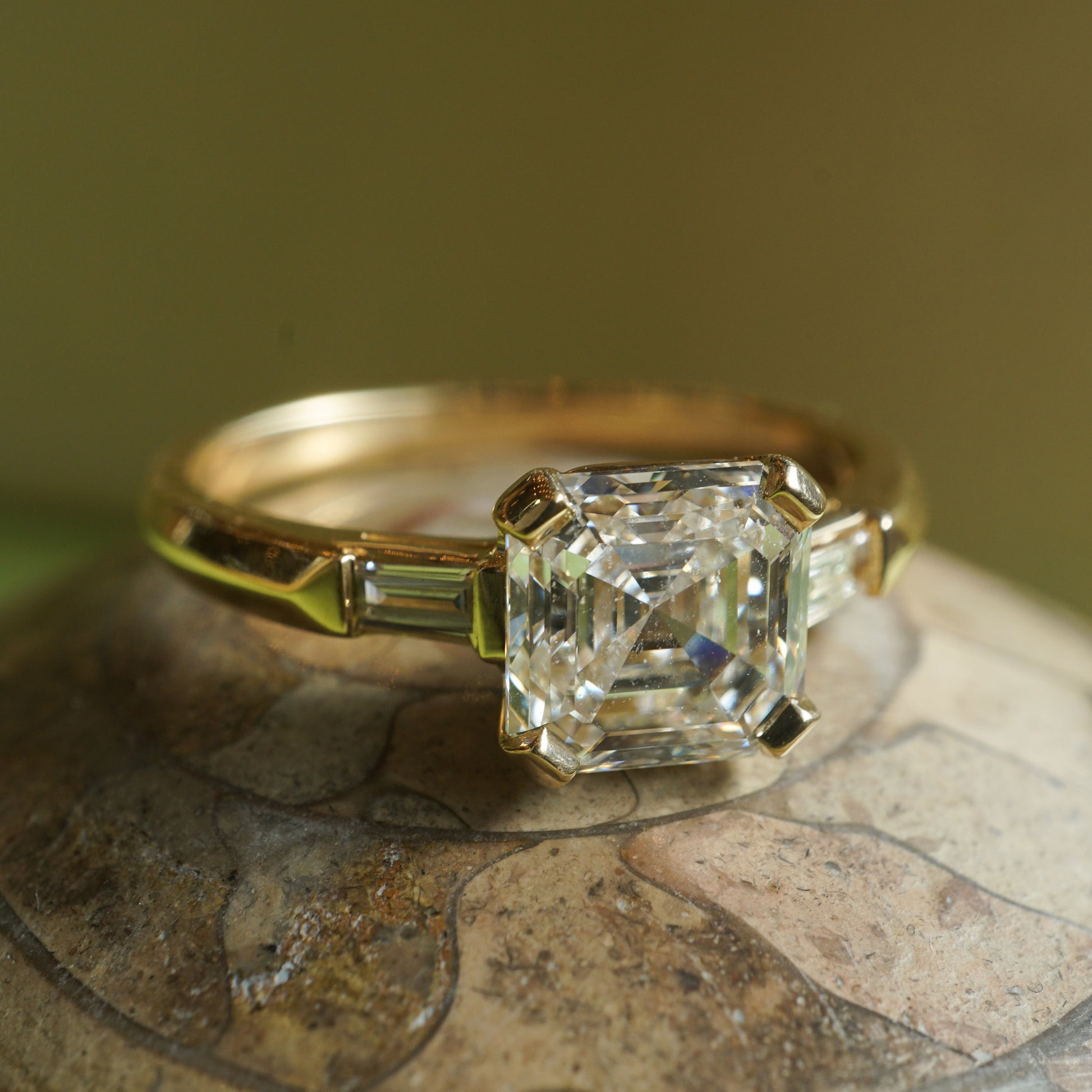 1.50 Asscher Cut Diamond Engagement Ring in 14k Yellow GoldComposition: 14 Karat Yellow Gold Ring Size: 5.75 Total Diamond Weight: 1.66ct Total Gram Weight: 2.5 g Inscription: 14k
      