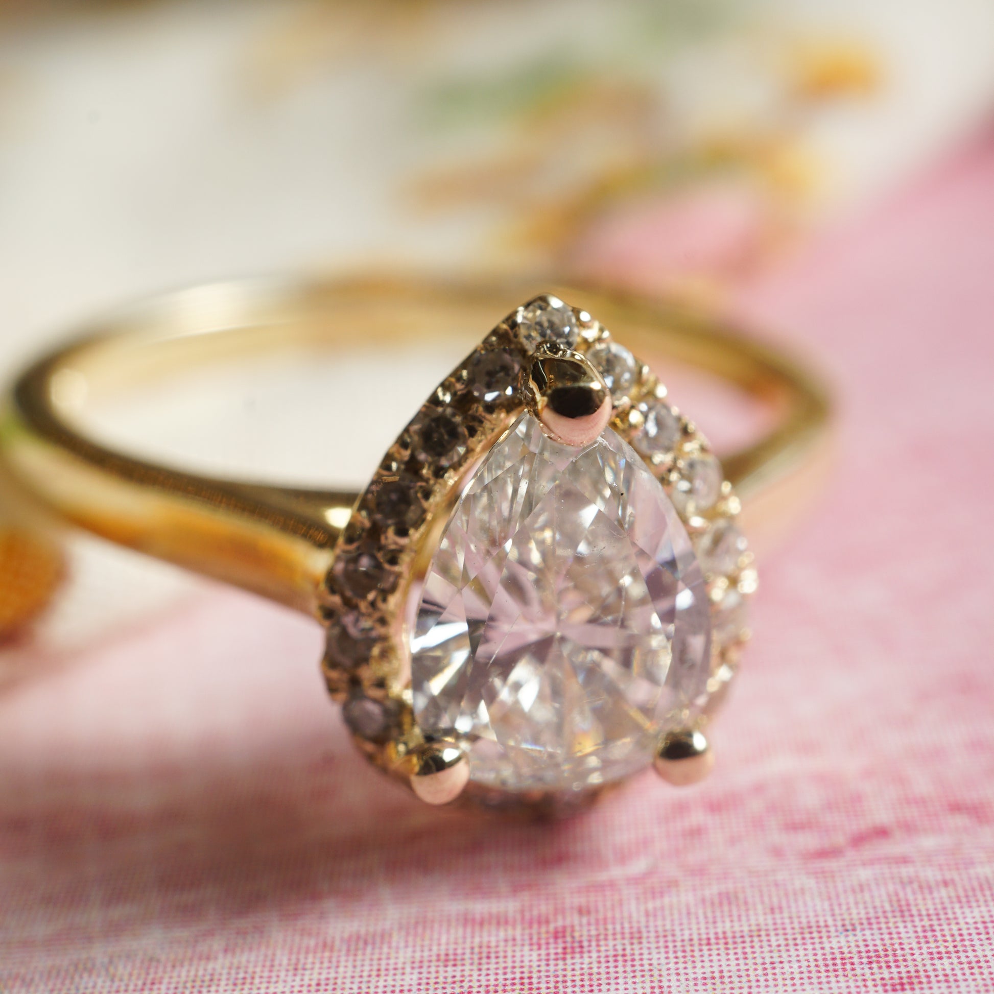 Pear Cut Diamond Halo Engagement Ring in 14k Yellow Gold