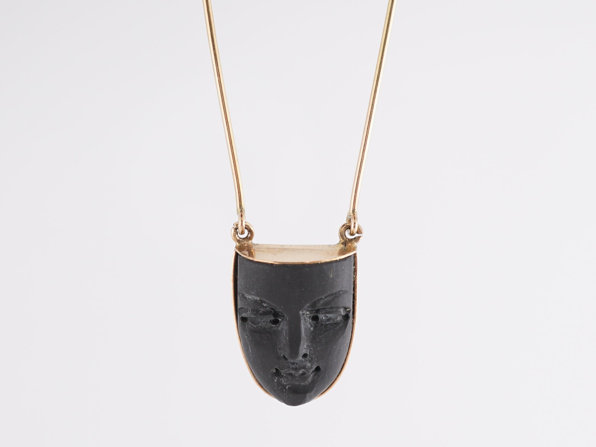8 Inch Face Pendant in 18k Yellow GoldComposition: PlatinumTotal Gram Weight: 7.5 gInscription: 750