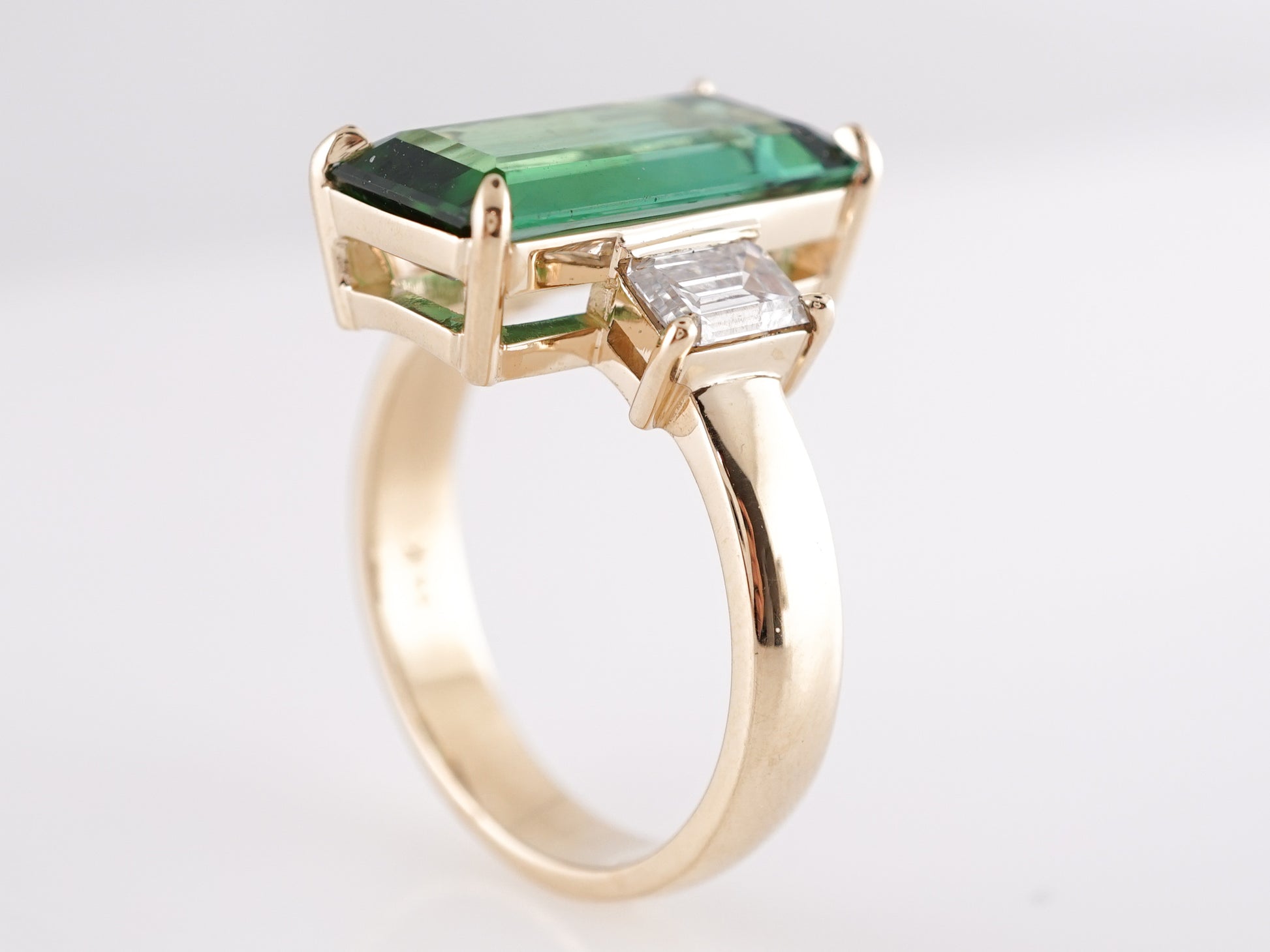 4.12 Tourmaline Engagement Ring in 14k Yellow GoldComposition: Platinum Ring Size: 6.25 Total Diamond Weight: .70ct Total Gram Weight: 5.5 g Inscription: 14k
      