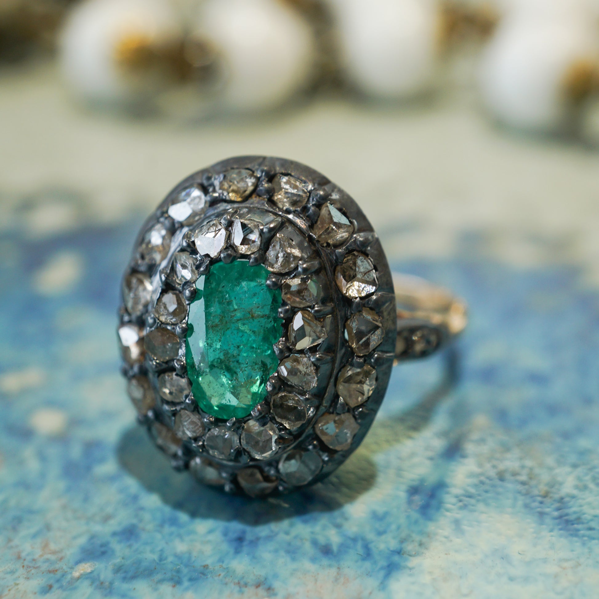 1820's Georgian Emerald Ring in Silver & 14k Yellow GoldComposition: 14 Karat Yellow Gold/Sterling Silver Ring Size: 6.5 Total Diamond Weight: .765ct Total Gram Weight: 3.8 g