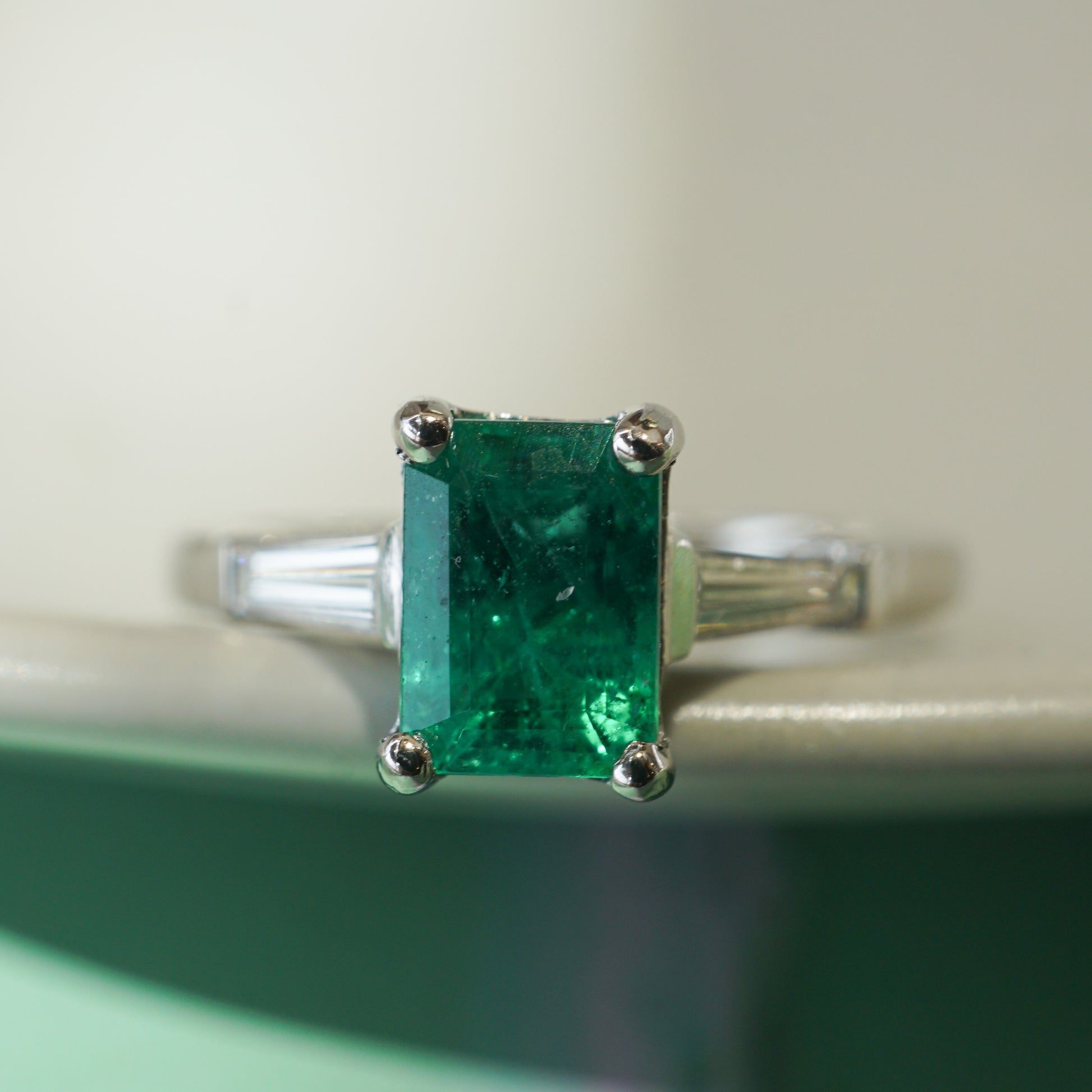 Mid-Century 1.12 Emerald & Diamond Ring in PlatinumComposition: PlatinumRing Size: 5.75Total Diamond Weight: .28 ctTotal Gram Weight: 5.2 gInscription: 950 PLAT