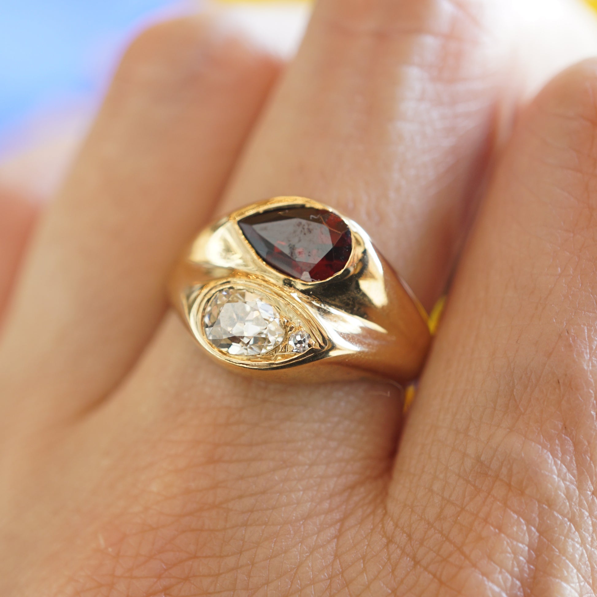Mid-Century Garnet & Diamond Cocktail Ring in 14k Yellow GoldComposition: Platinum Ring Size: 6 Total Diamond Weight: .362ct Total Gram Weight: 5.7 g Inscription: 14k 
      