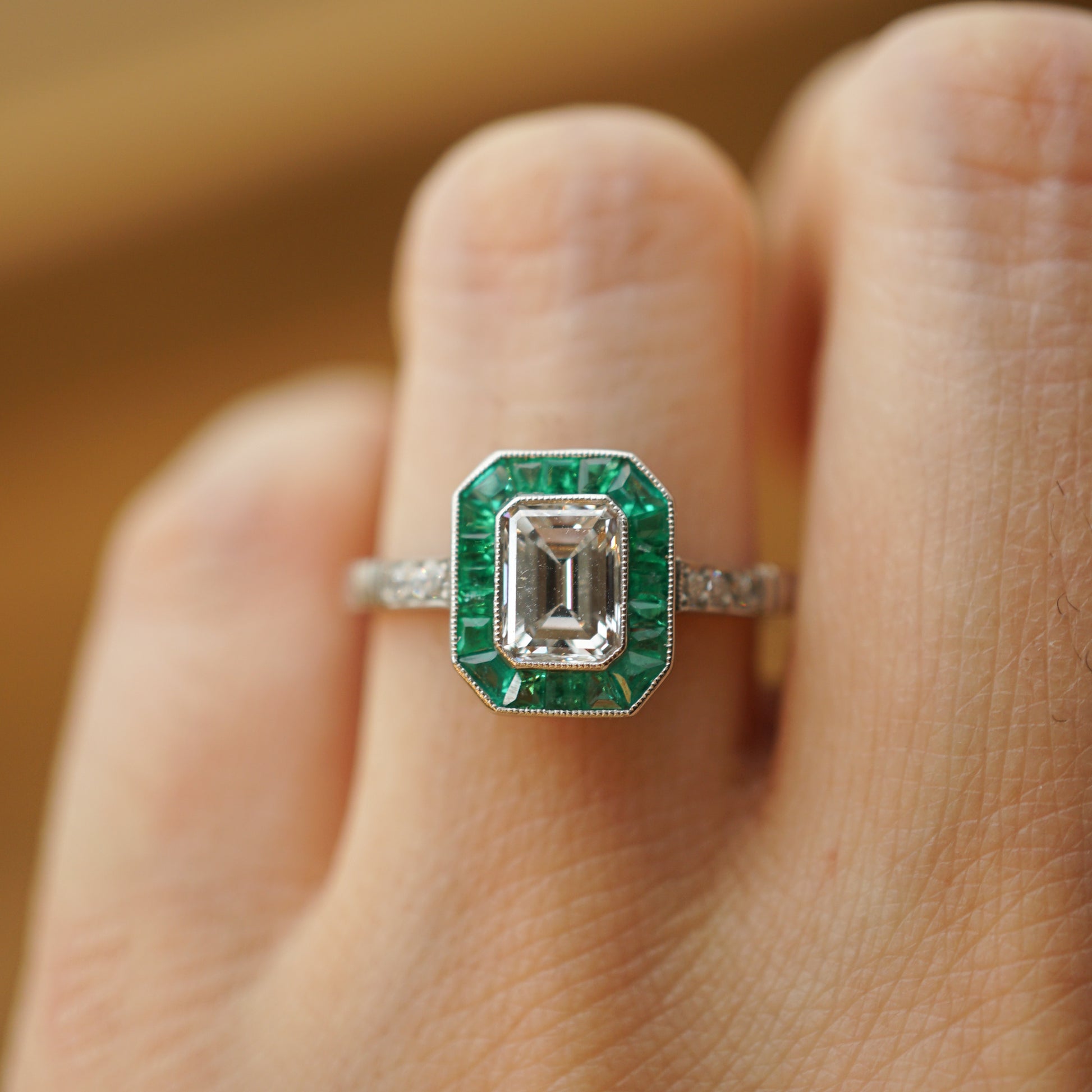 .74 Emerald Cut Diamond & Emerald Engagement Ring in PlatinumComposition: Platinum Ring Size: 6.5 Total Diamond Weight: .80ct Total Gram Weight: 4.2 g