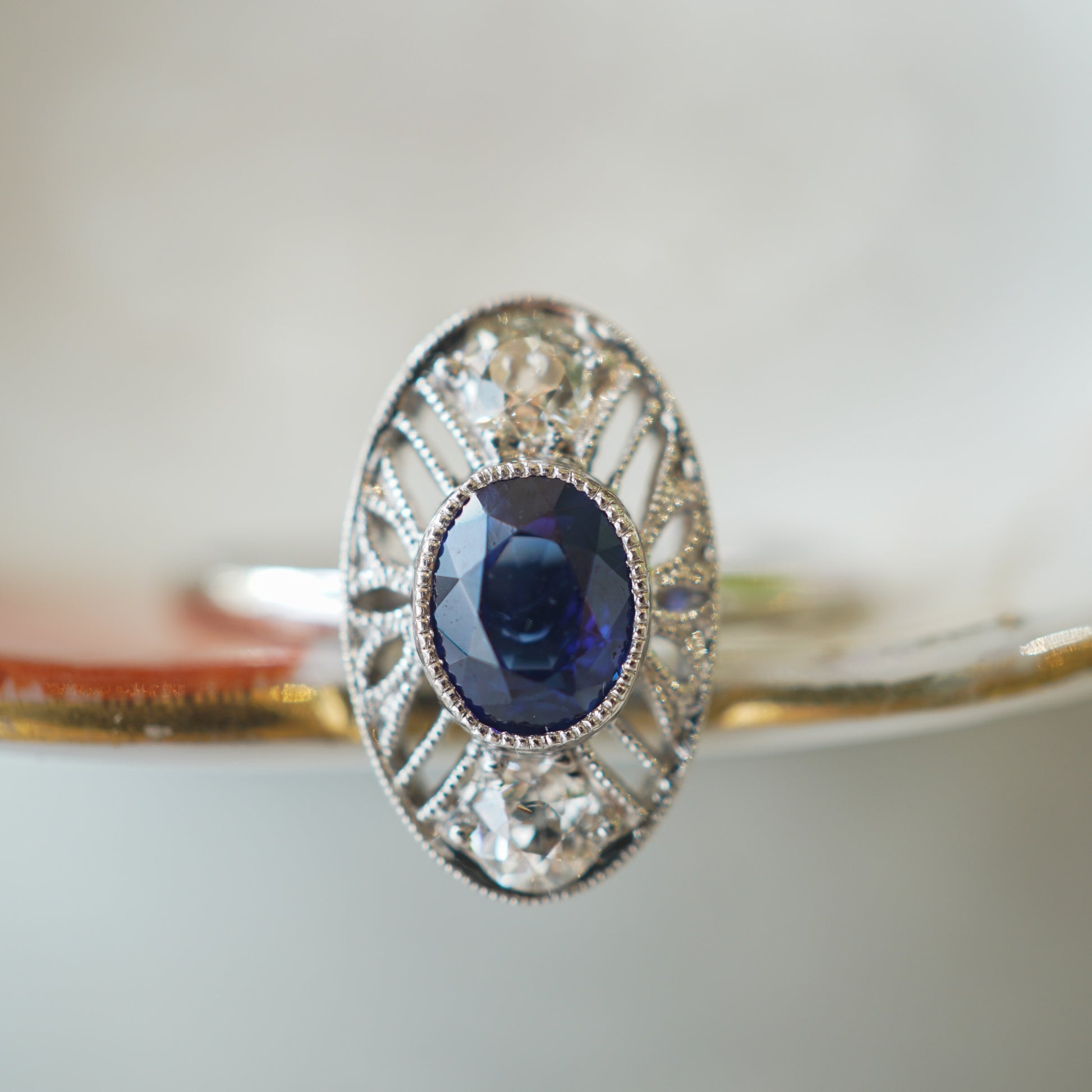 Oval Art Deco Sapphire & Diamond Ring in 14k & PlatinumComposition: 14 Karat White Gold/Platinum Ring Size: 6.5 Total Diamond Weight: .28ct Total Gram Weight: 2.5 g Inscription: 14k
      