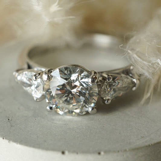 Three Stone Diamond Engagement Ring with Pear Diamond Accents