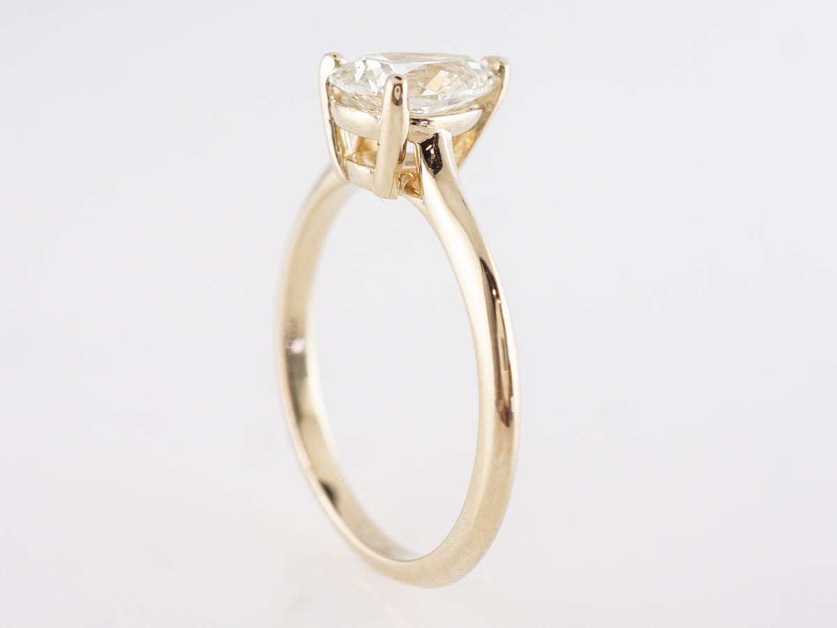 Solitaire Pear Cut Diamond Engagement Ring in 14k Yellow Gold