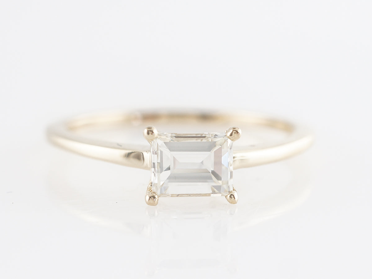 Emerald Cut Solitaire Diamond Engagement Ring in Yellow Gold