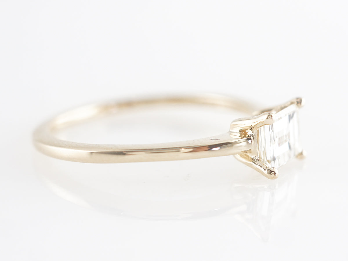 Emerald Cut Solitaire Diamond Engagement Ring in Yellow Gold