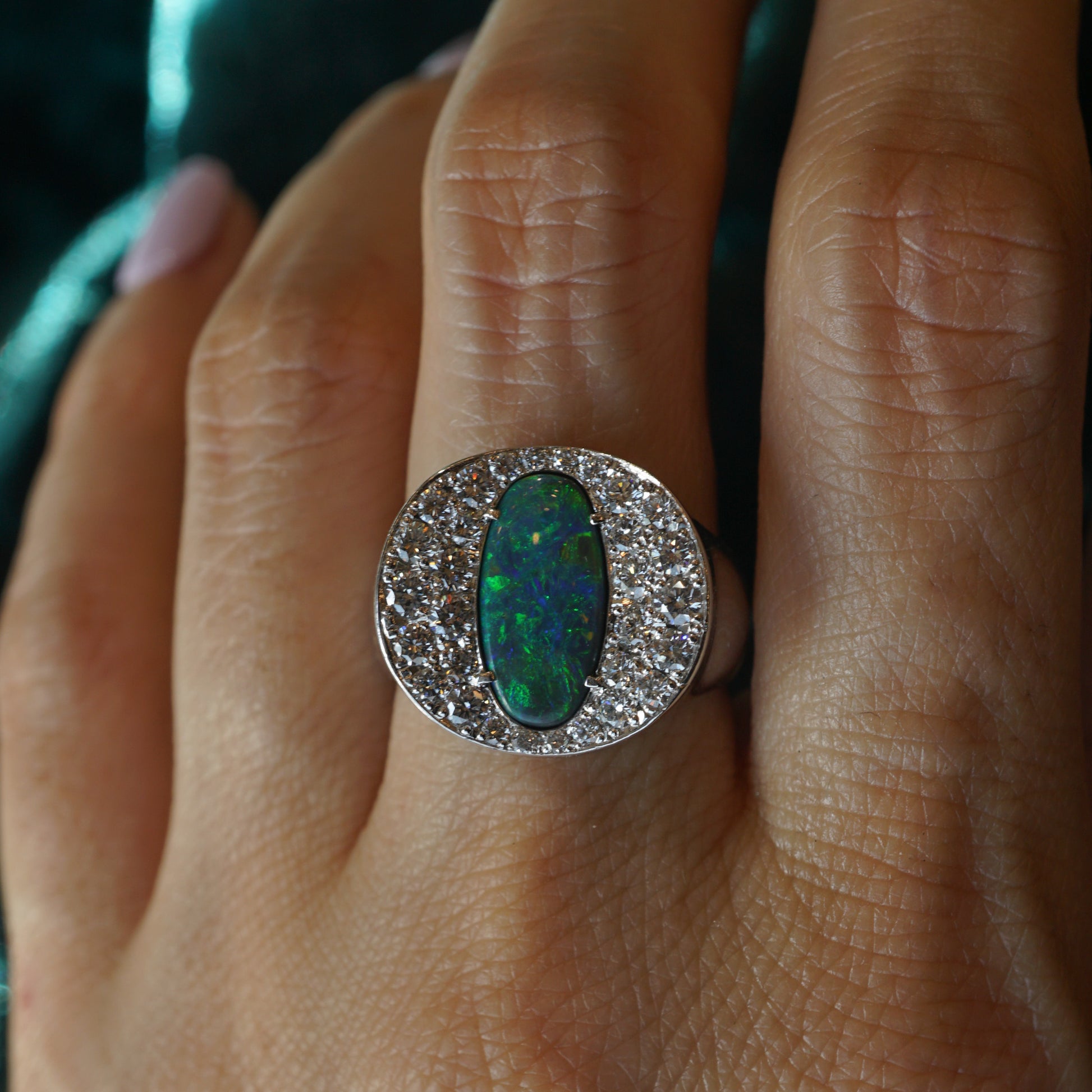 Pave Diamond & Opal Cocktail Ring in PlatinumComposition: PlatinumRing Size: 6Total Diamond Weight: .80 ctTotal Gram Weight: 11.4 gInscription: PLATINUM