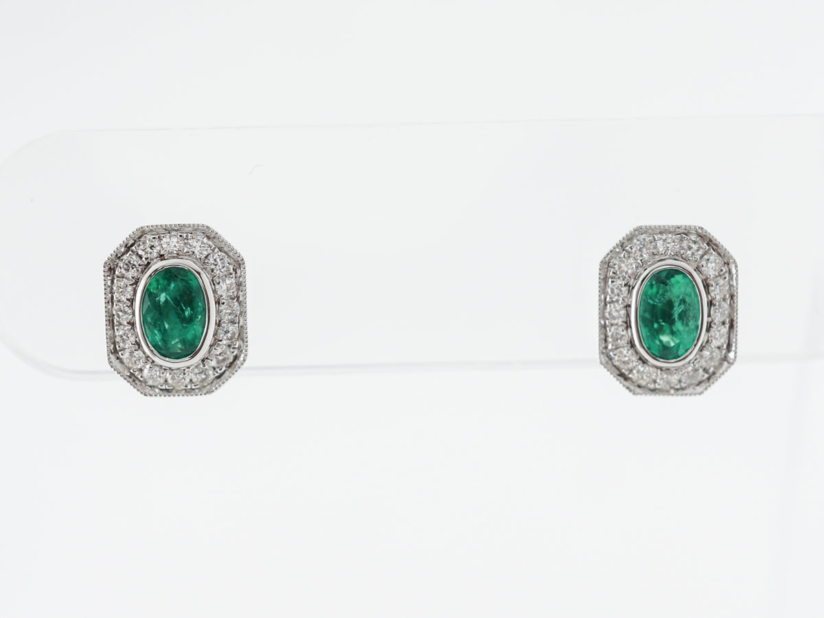 Emerald & Diamond Halo Earrings in 14k White Gold