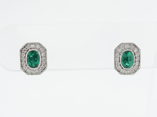 Emerald & Diamond Halo Earrings in 14k White Gold