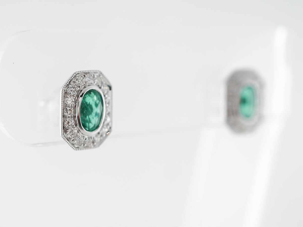 Emerald & Diamond Halo Earrings in 14k White Gold