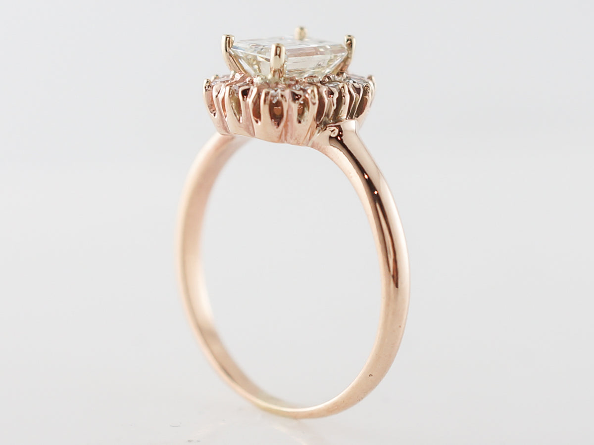 Emerald Cut Halo Engagement Ring in Rose Gold