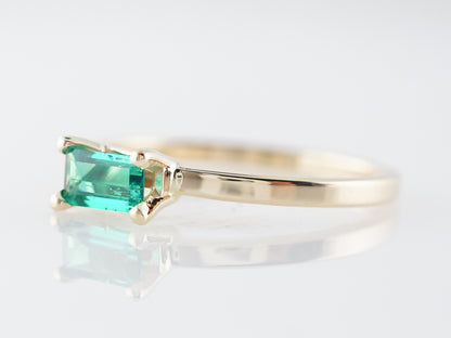 Emerald Cut Emerald Ring in 14k Yellow Gold