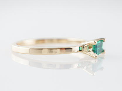 Emerald Cut Emerald Ring in 14k Yellow Gold