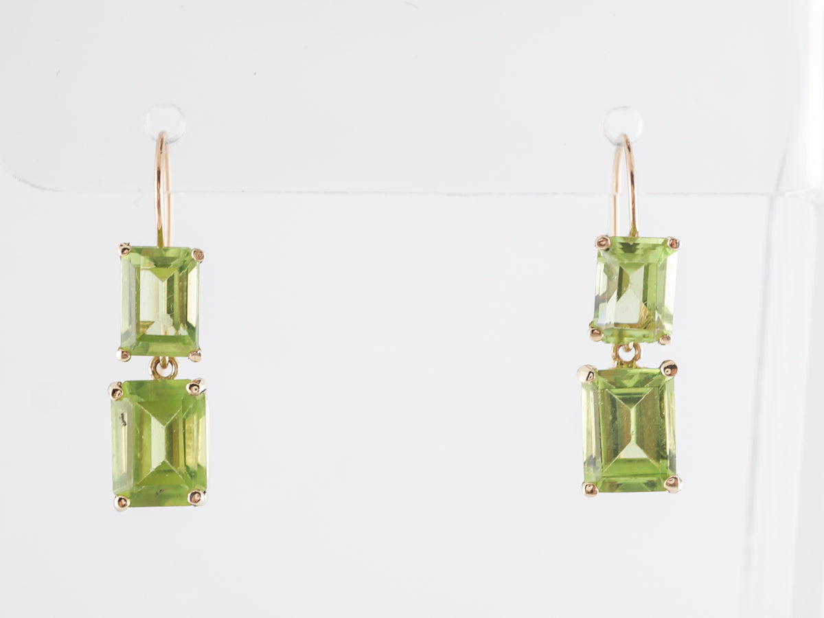 Emerald Cut Peridot Drop Earrings in 14k Yellow Gold