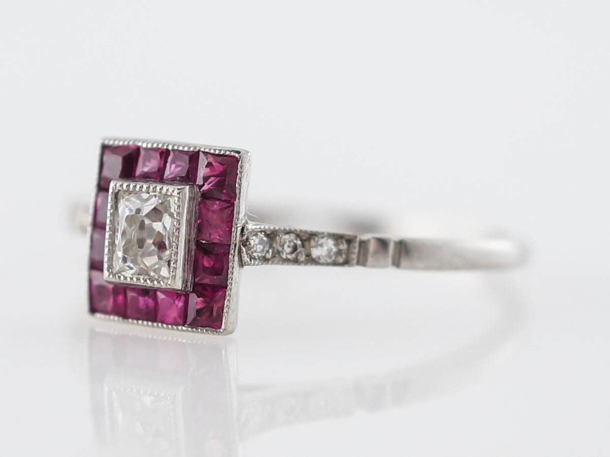 Diamond & Ruby Halo Engagement Ring in Platinum