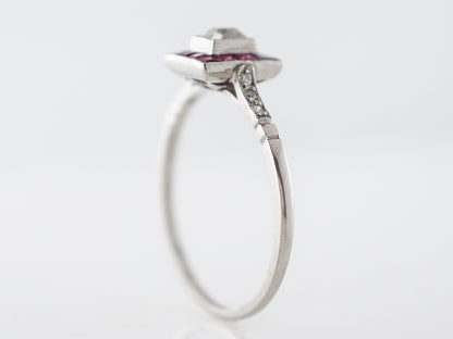 Diamond & Ruby Halo Engagement Ring in Platinum