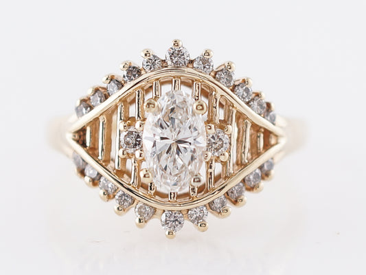 Half Carat Oval Diamond Ring w/ Yellow Gold Filigree