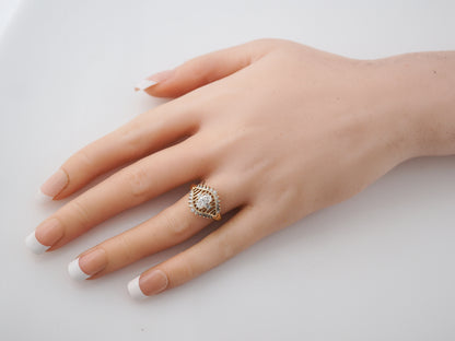 Half Carat Oval Diamond Ring w/ Yellow Gold Filigree