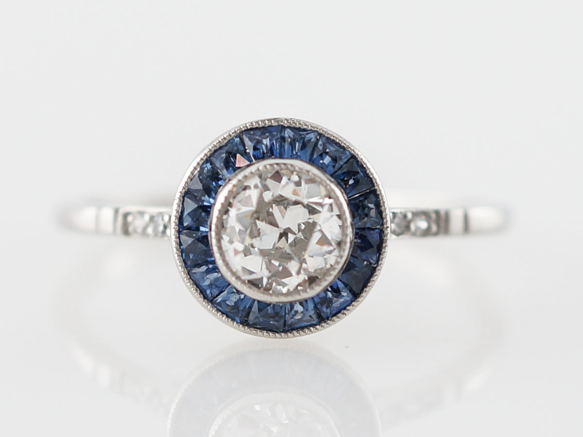 Diamond & Sapphire Halo Engagement Ring in Platinum