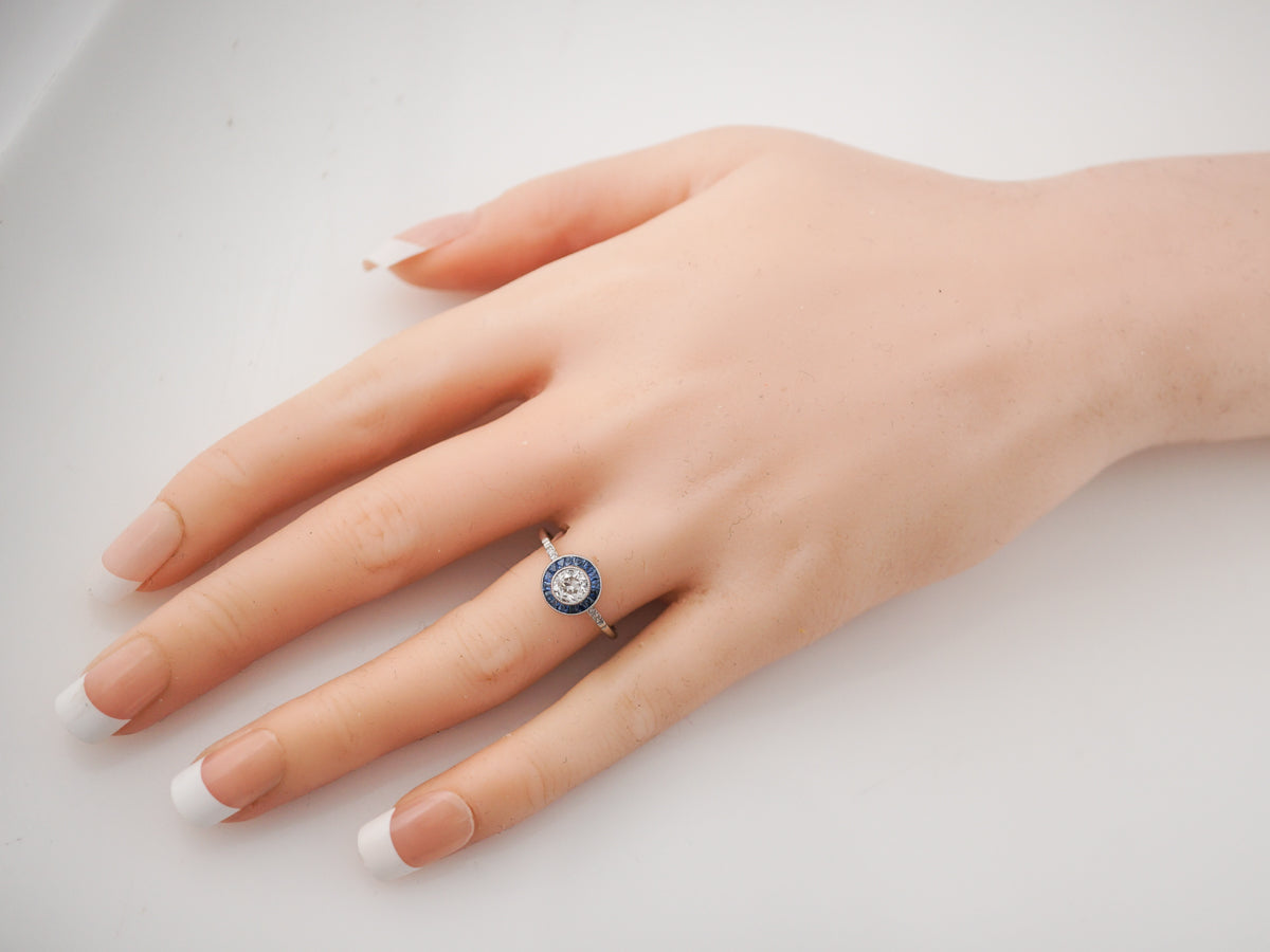 Diamond & Sapphire Halo Engagement Ring in Platinum