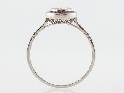 Ruby & Diamond Halo Engagement Ring in Platinum